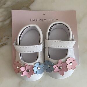 White and Pink Baby Shoes
